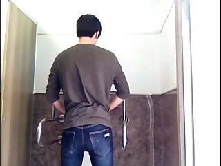 Korean Boy Play With Toy In Public WC